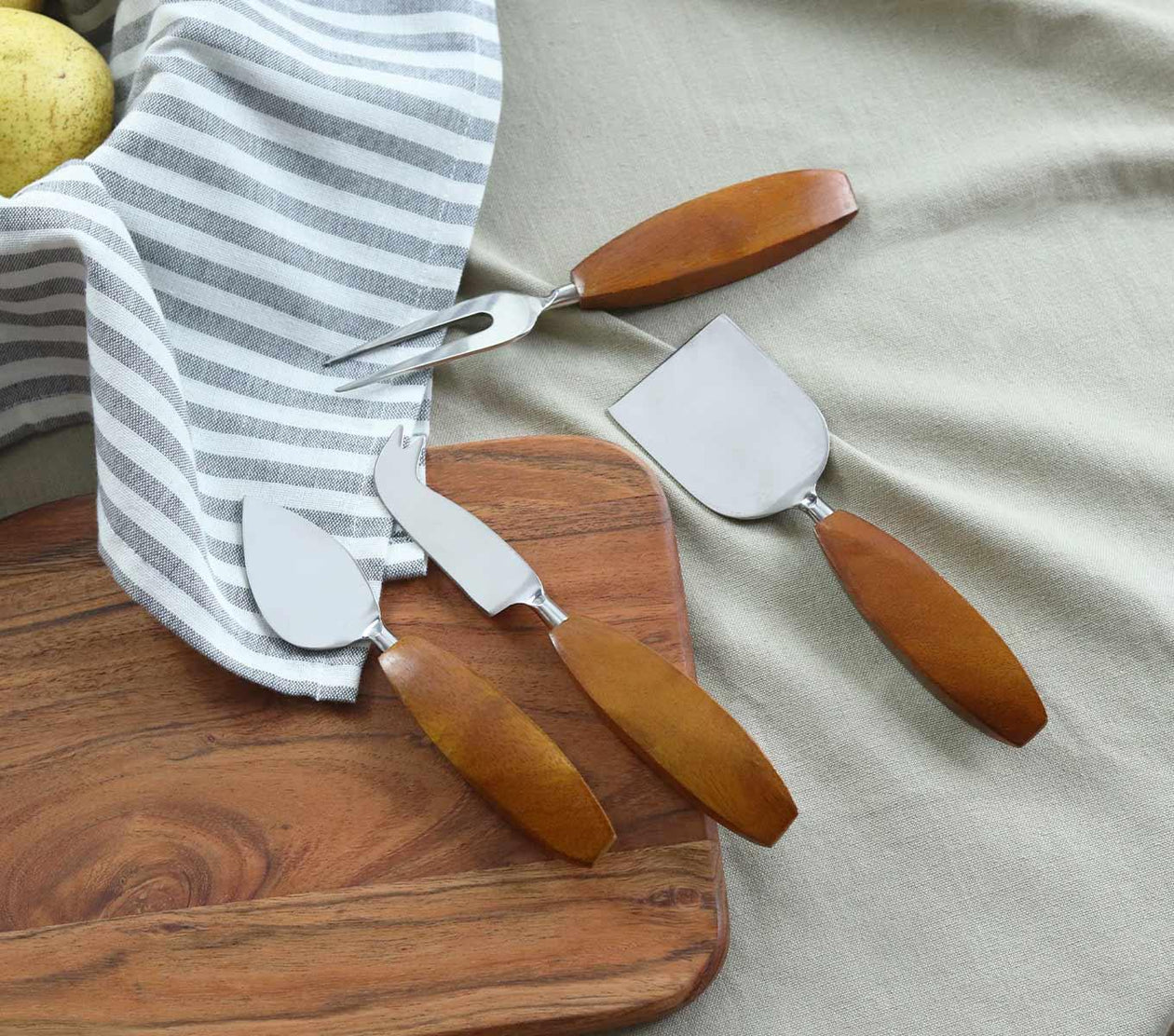 https://www.nappadori.com/cdn/shop/products/cheese-knives-wood-2.jpg?v=1668836749&width=1260